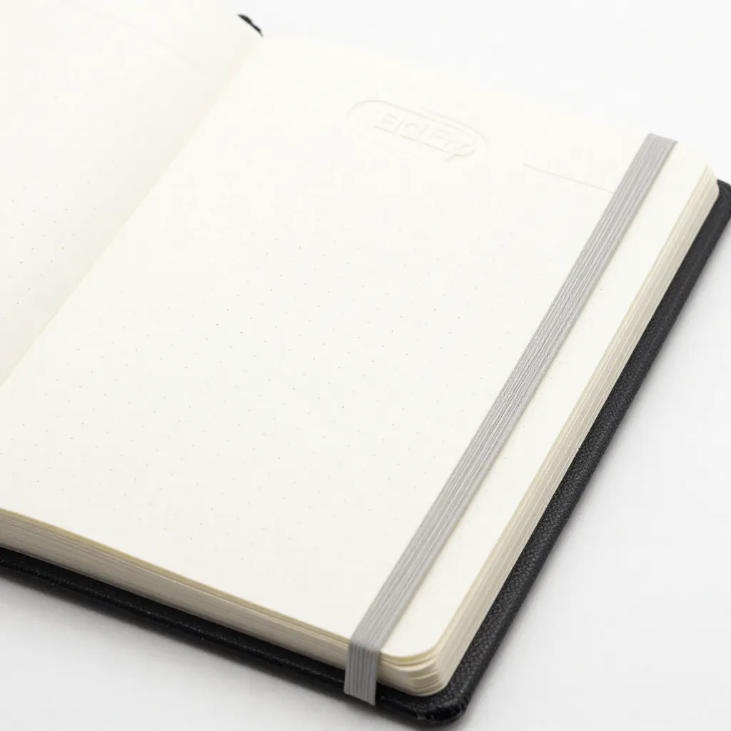 Liggflat planlegger med debosert omslagsdesign